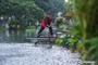 River chief Wang Jia clears away floating waste on a river in Changxing County, east China's Zhejiang Province, Oct. 12, 2017. China's annual political sessions of the National People's Congress (NPC) and the National Committee of the Chinese People's Political Consultative Conference (CPPCC) are scheduled to convene in March, 2018. During the two sessions, development agendas will be reviewed and discussed, and key policies will be adopted. Year 2018 marks the first year of fully implementing the spirit of the 19th National Congress of the Communist Party of China, which vowed to pursue the vision of innovative, coordinated, green, and open development that is for everyone. The CPC congress stressed that building an ecological civilization is vital to sustain the Chinese nation's development, 